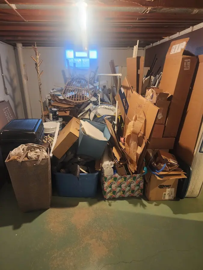 Roll-off dumpster container at job site for 2 Yard Dumpster Rental in San Marcos